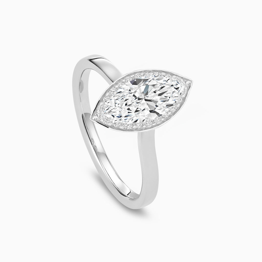 The Ecksand Love-Knot Diamond Halo Engagement Ring shown with  in 