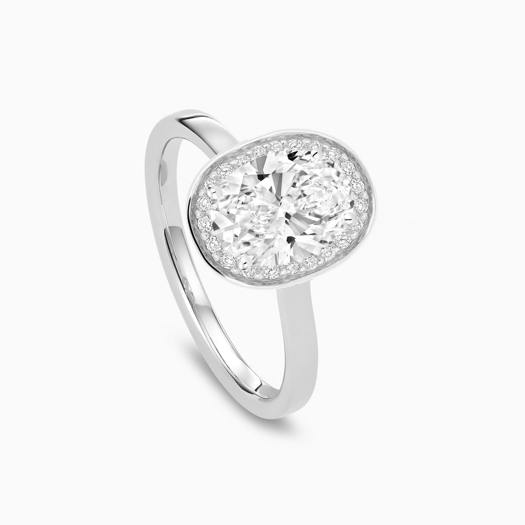 The Ecksand Love-Knot Diamond Halo Engagement Ring shown with  in 