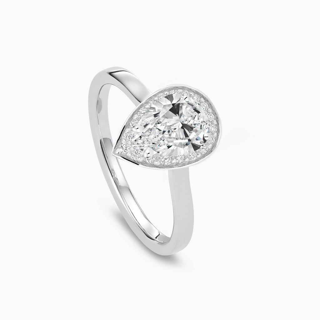 The Ecksand Love-Knot Diamond Halo Engagement Ring shown with  in 