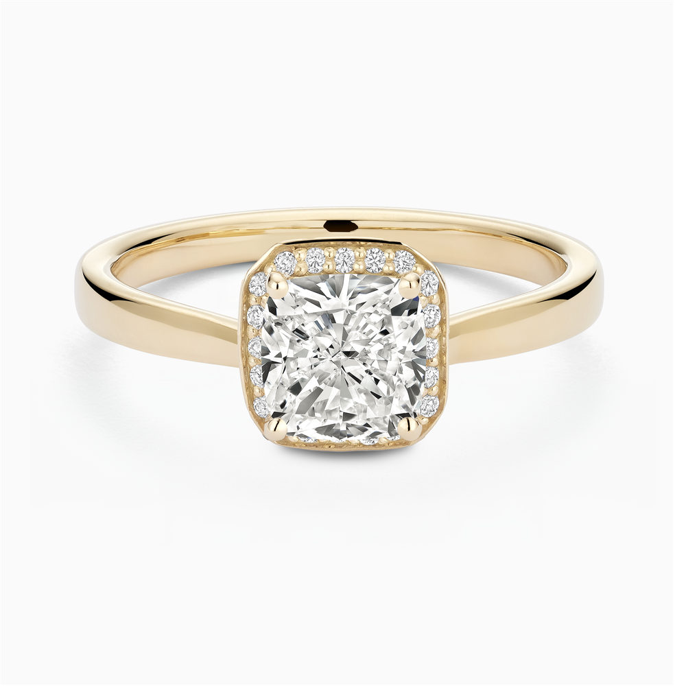 The Ecksand Love-Knot Diamond Halo Engagement Ring shown with Cushion in 14k Yellow Gold