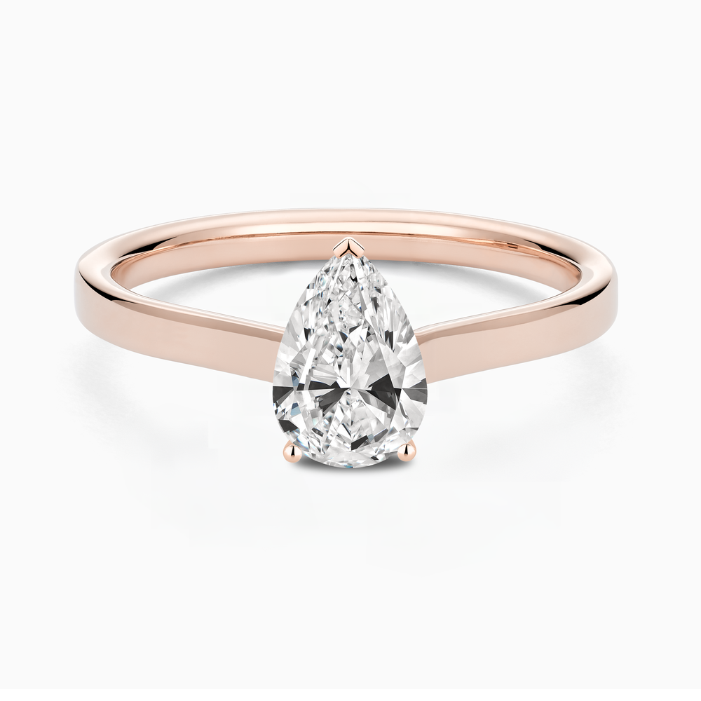 The Ecksand Iconic Hidden Diamond Halo Engagement Ring shown with Pear in 14k Rose Gold