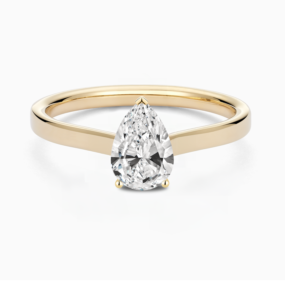 The Ecksand Iconic Hidden Diamond Halo Engagement Ring shown with Pear in 14k Yellow Gold