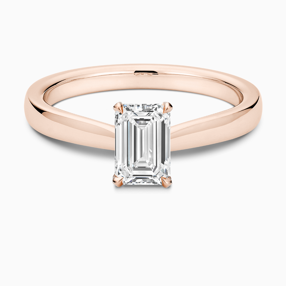 The Ecksand Love-Knot Solitaire Diamond Engagement Ring with Eagle Prongs shown with Emerald in 14k Rose Gold