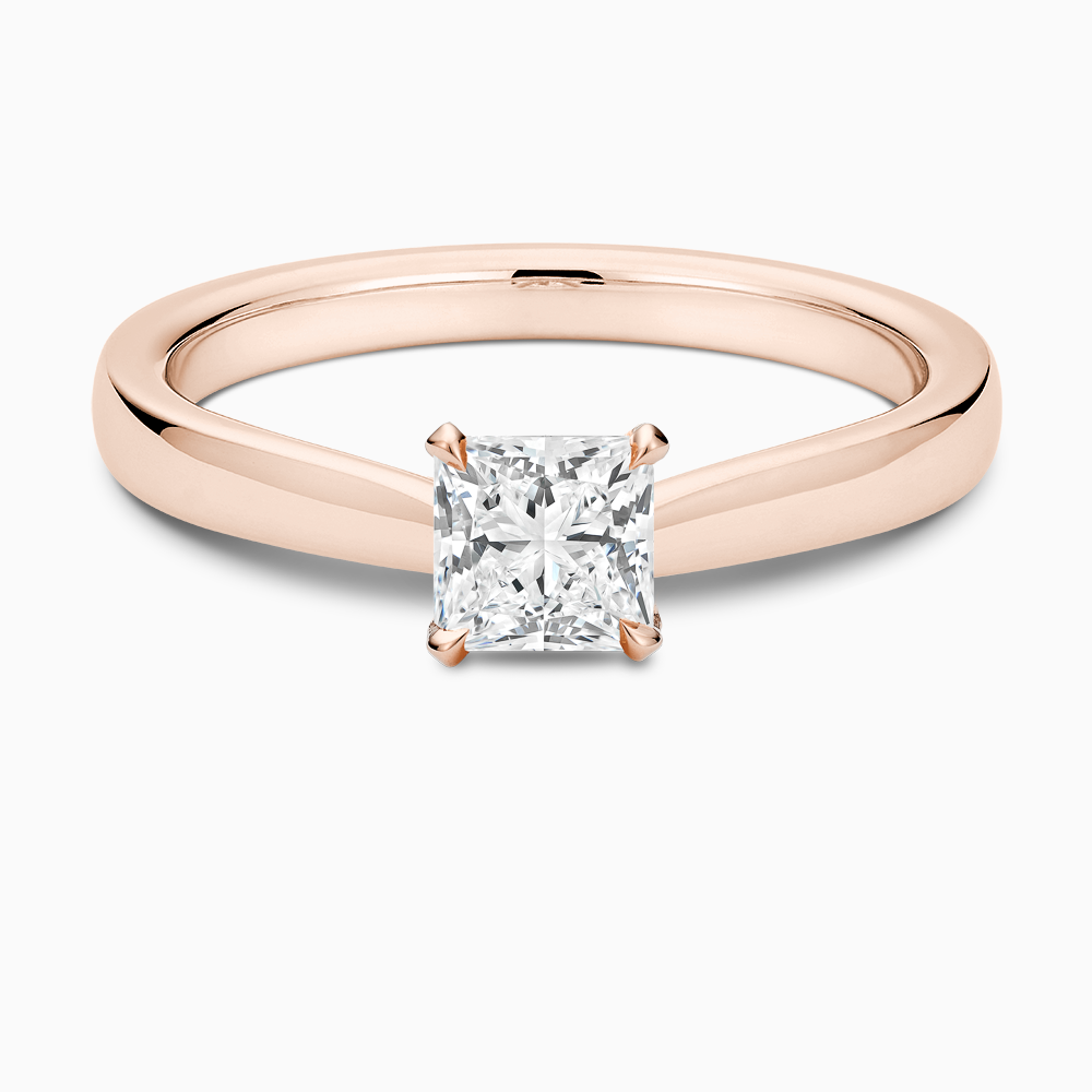The Ecksand Love-Knot Solitaire Diamond Engagement Ring with Eagle Prongs shown with Princess in 14k Rose Gold