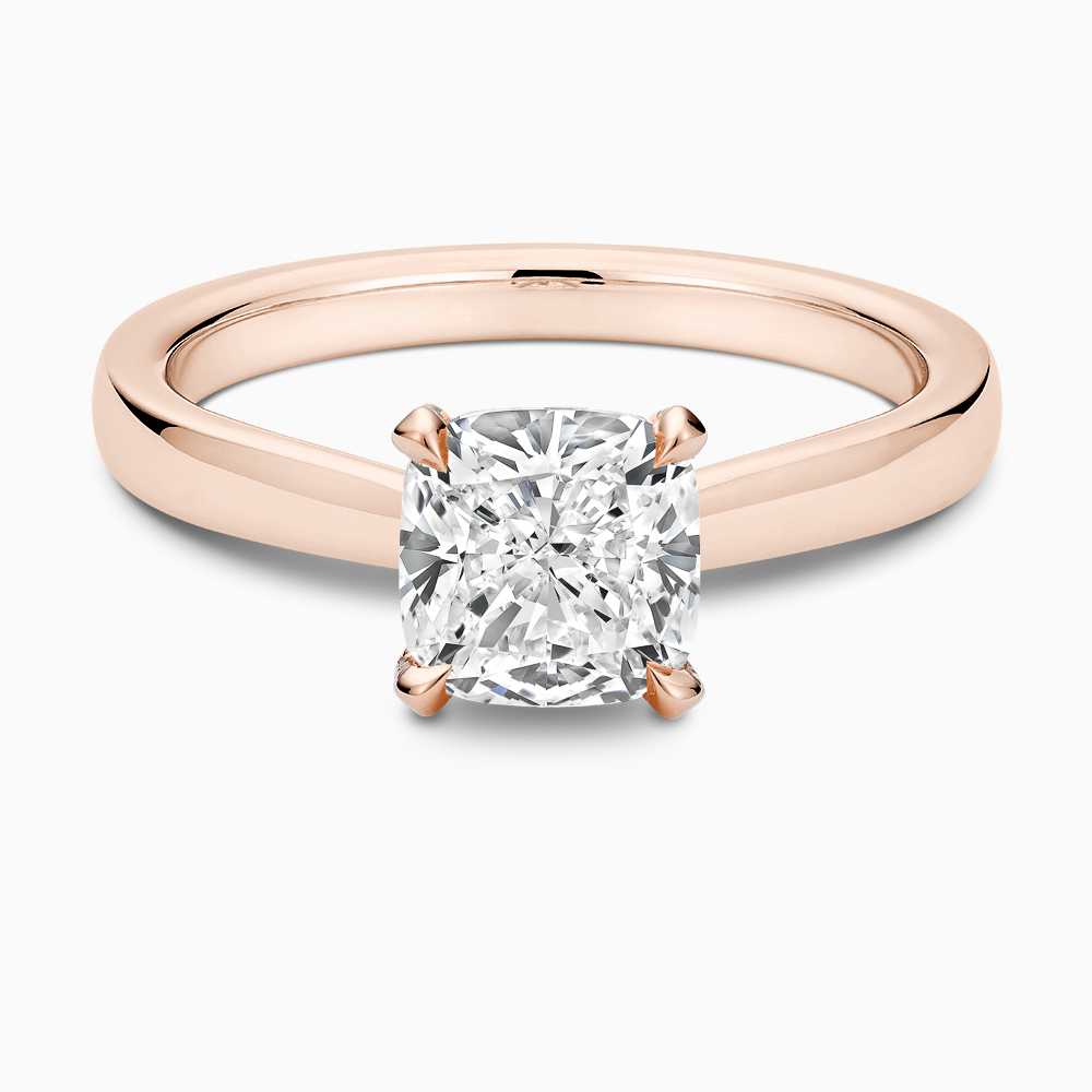 The Ecksand Love-Knot Solitaire Diamond Engagement Ring with Eagle Prongs shown with Cushion in 14k Rose Gold