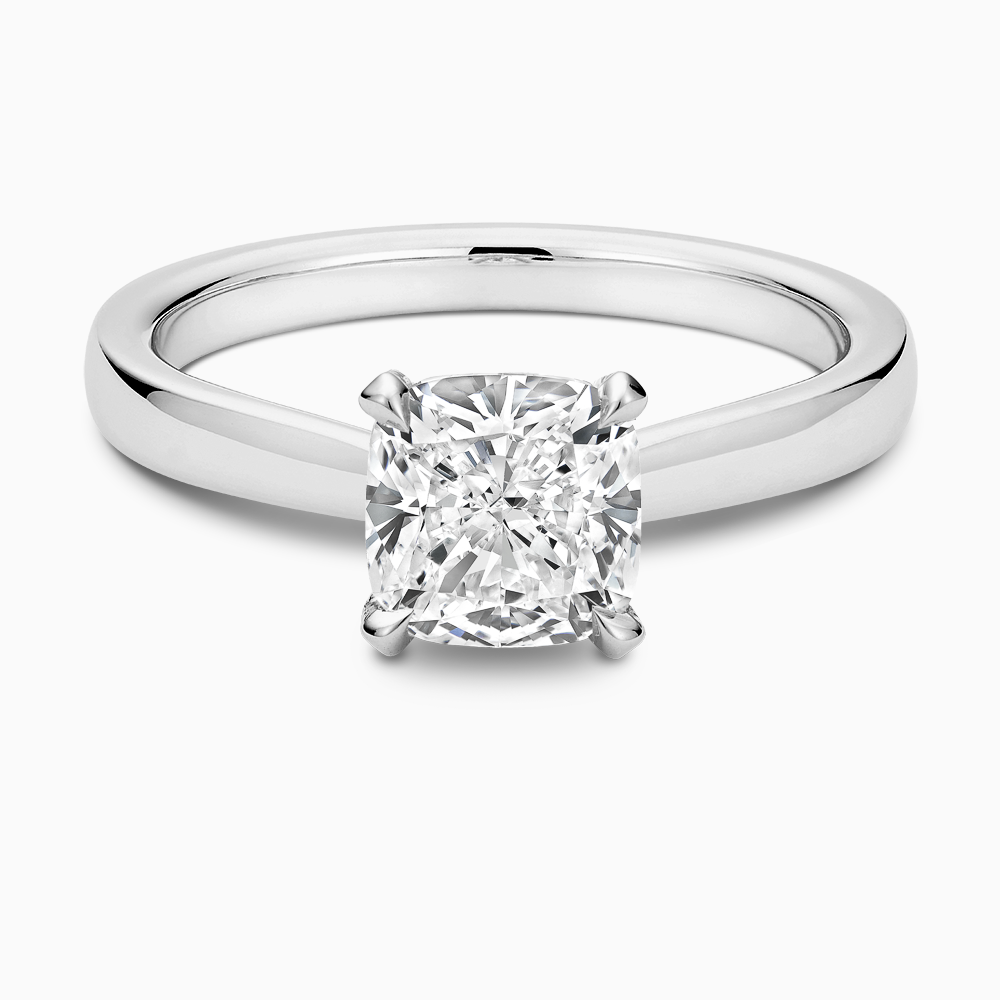 The Ecksand Love-Knot Solitaire Diamond Engagement Ring with Eagle Prongs shown with Cushion in 18k White Gold