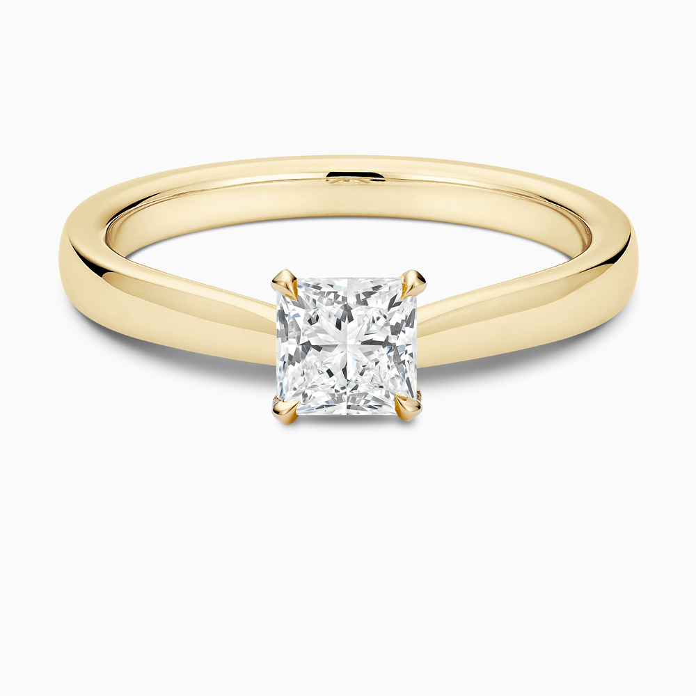 The Ecksand Love-Knot Solitaire Diamond Engagement Ring with Eagle Prongs shown with Princess in 18k Yellow Gold