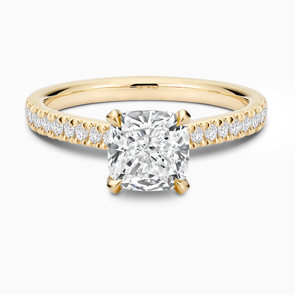 The Ecksand Love-Knot Diamond Engagement Ring with Eagle Prongs shown with Cushion in 18k Yellow Gold