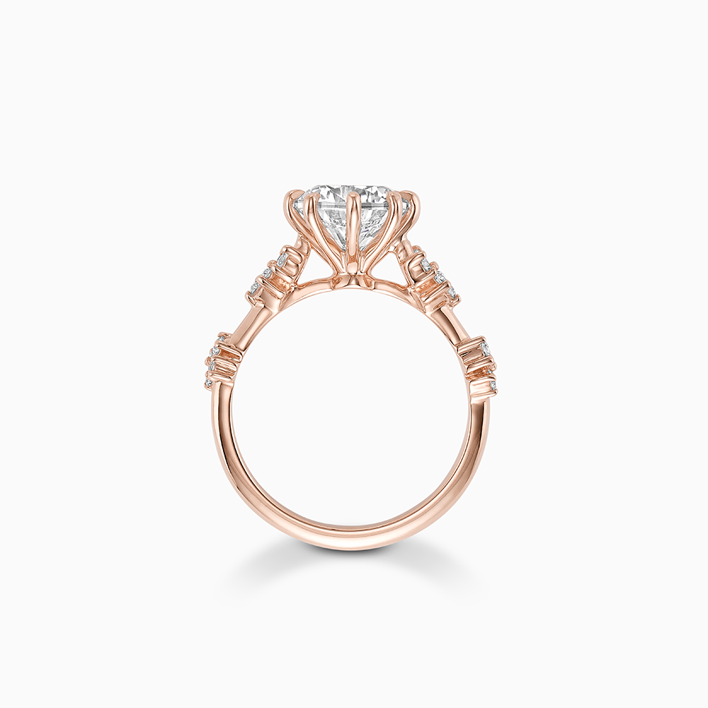 Profile view of Ecksand's Eight-Prong Blossom Engagement Ring with Side Diamonds in 14k Rose Gold, Heart