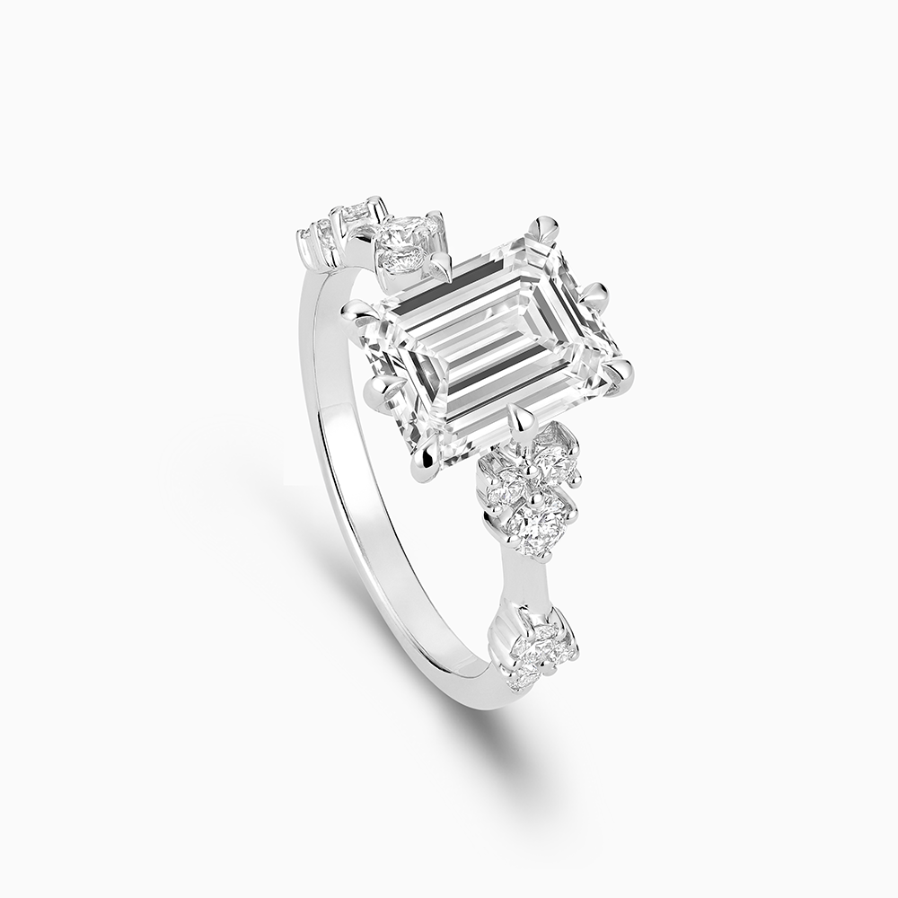 The Ecksand Eight-Prong Blossom Engagement Ring with Side Diamonds shown with  in 