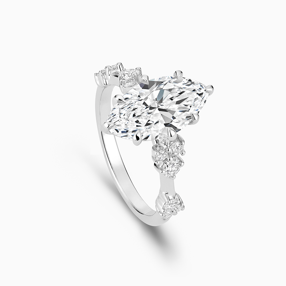 The Ecksand Eight-Prong Blossom Engagement Ring with Side Diamonds shown with  in 