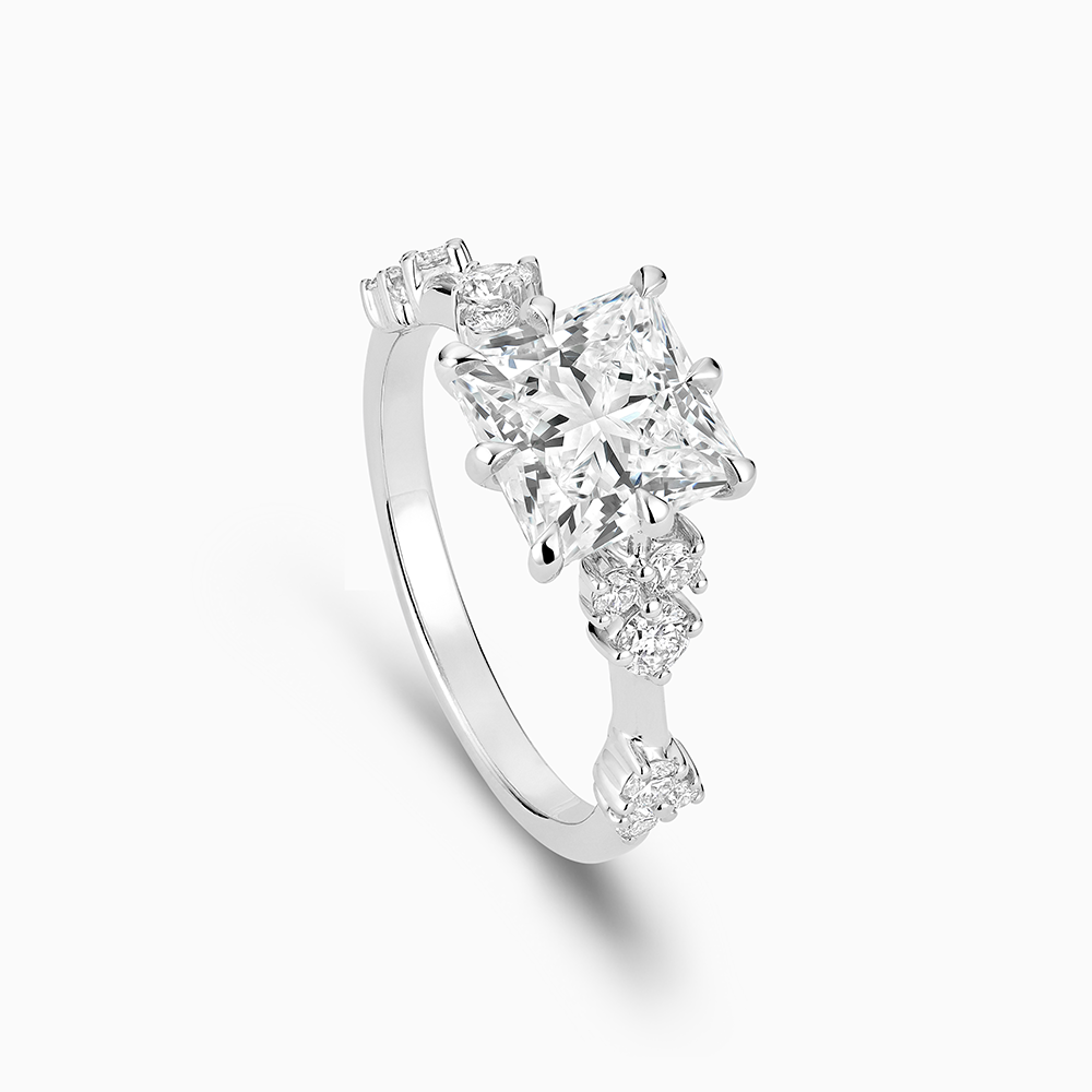 The Ecksand Eight-Prong Blossom Engagement Ring with Side Diamonds shown with  in 