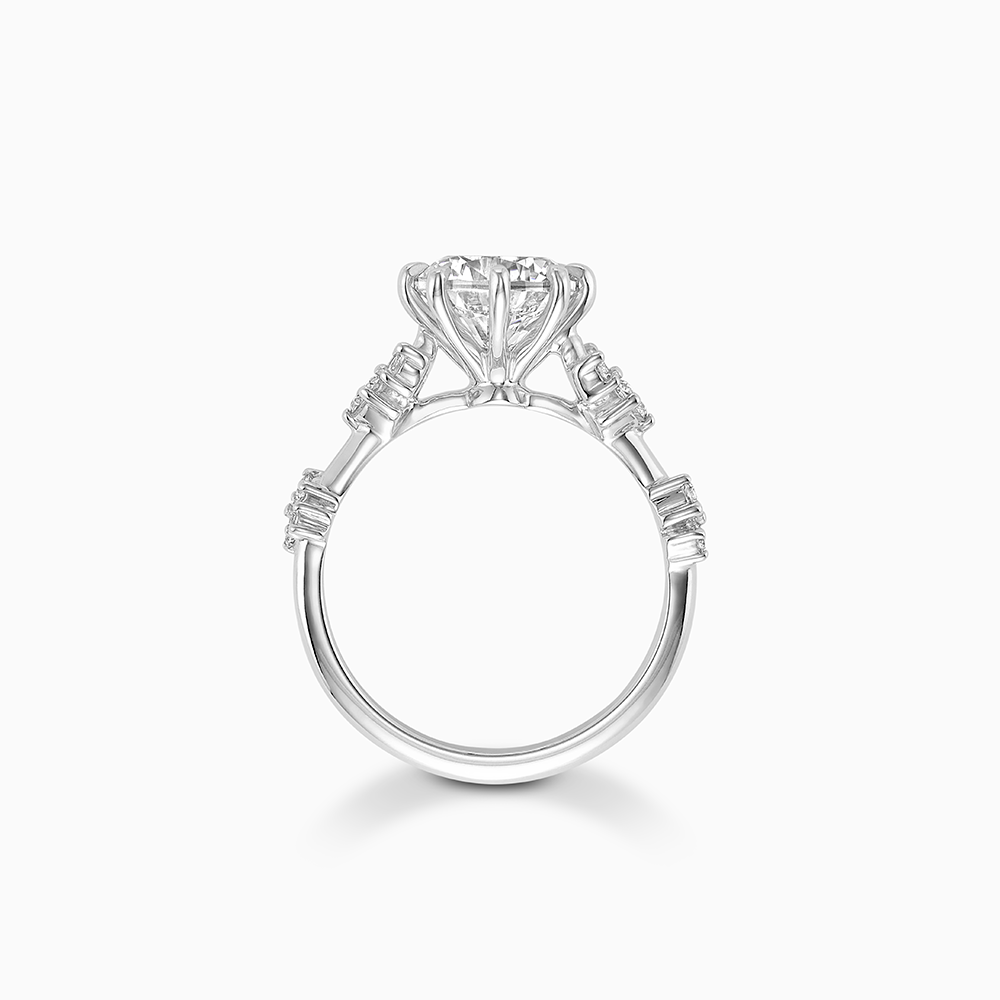 Profile view of Ecksand's Eight-Prong Blossom Engagement Ring with Side Diamonds in Platinum, Heart