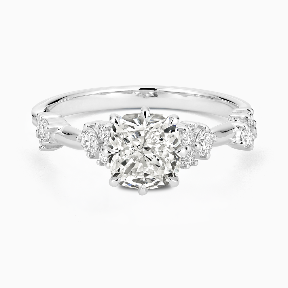 The Ecksand Eight-Prong Blossom Engagement Ring with Side Diamonds shown with Cushion in 14k White Gold