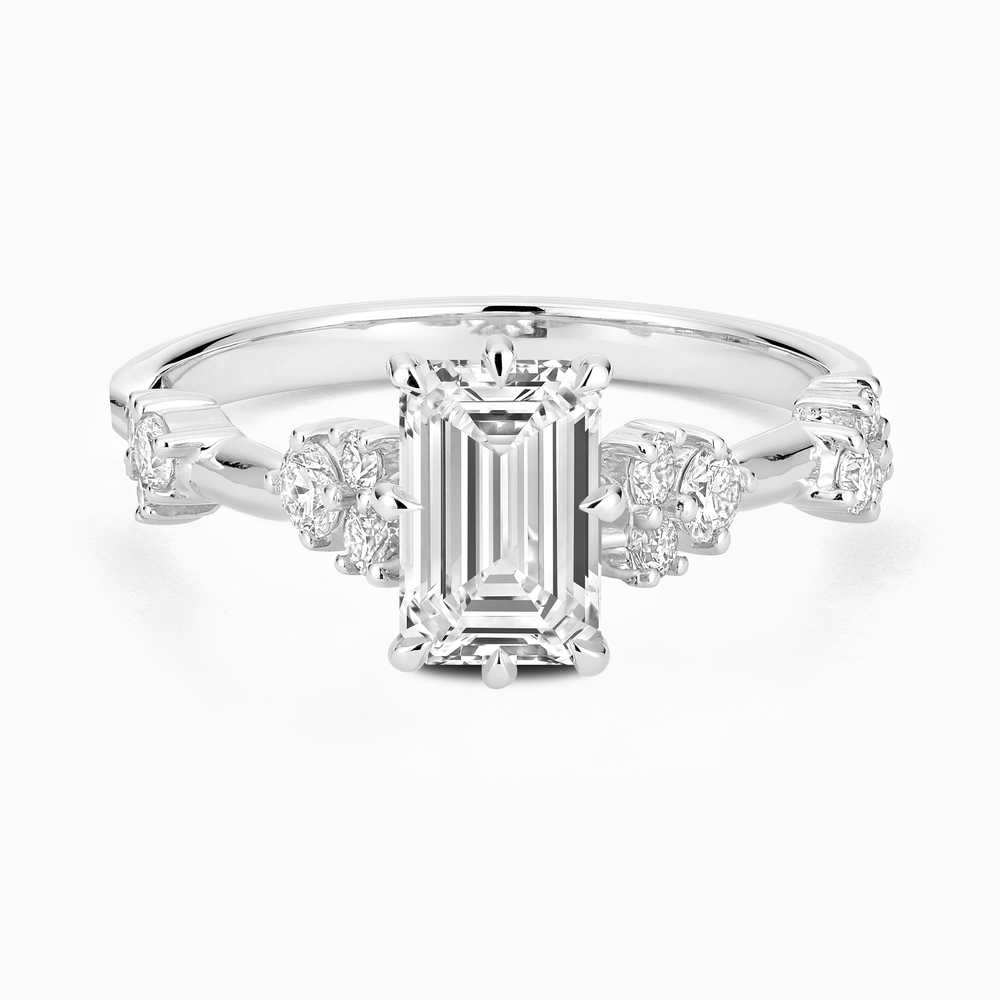 Ecksand's Eight-Prong Blossom Engagement Ring with Side Diamonds in Platinum, Emerald