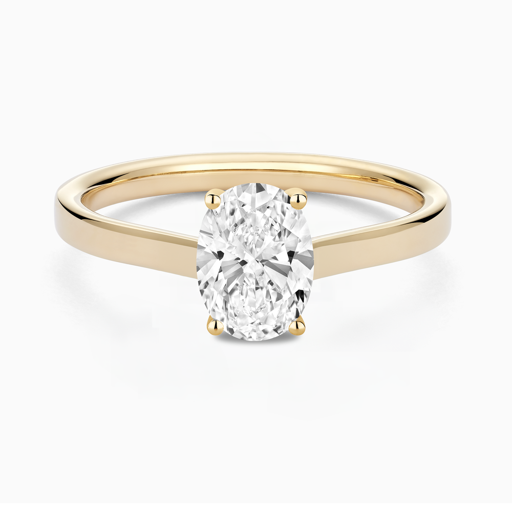 The Ecksand Iconic Hidden Diamond Halo Engagement Ring shown with Oval in 14k Yellow Gold