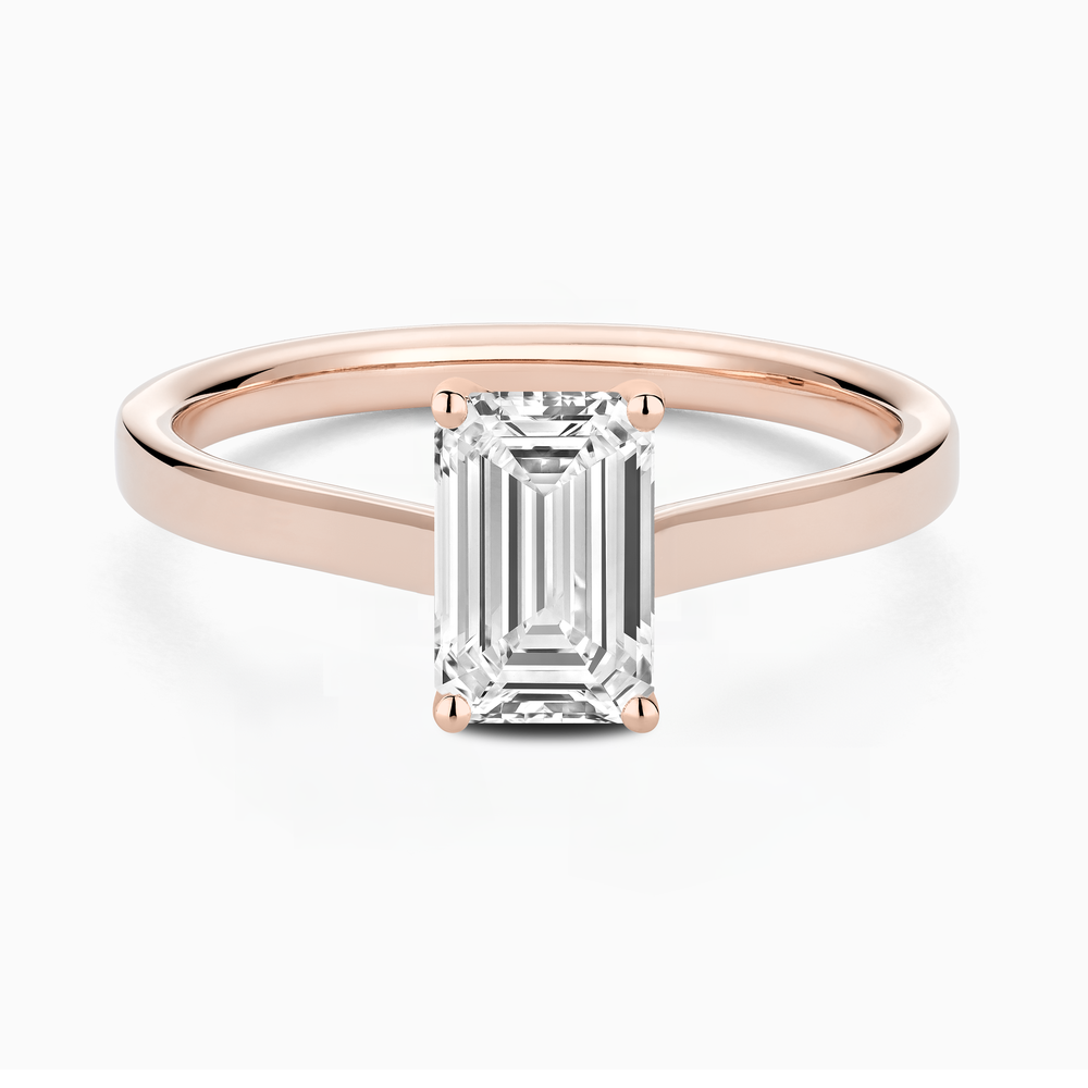 The Ecksand Iconic Hidden Diamond Halo Engagement Ring shown with Emerald in 14k Rose Gold