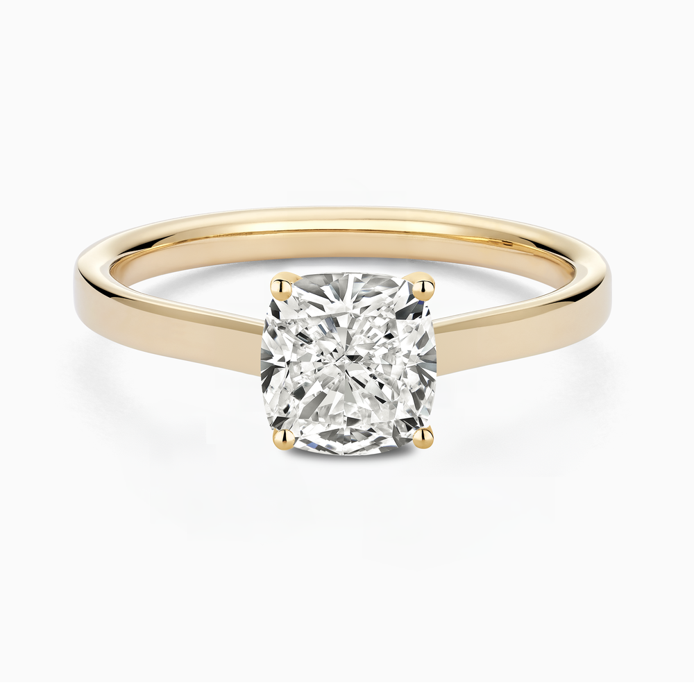 The Ecksand Iconic Hidden Diamond Halo Engagement Ring shown with Cushion in 14k Yellow Gold