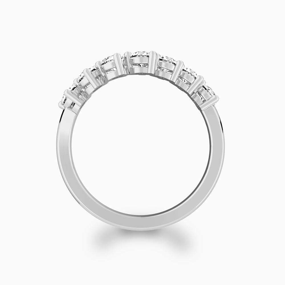 Canadian-made seven stone diamond wedding ring in 18K white gold. Side profile view.