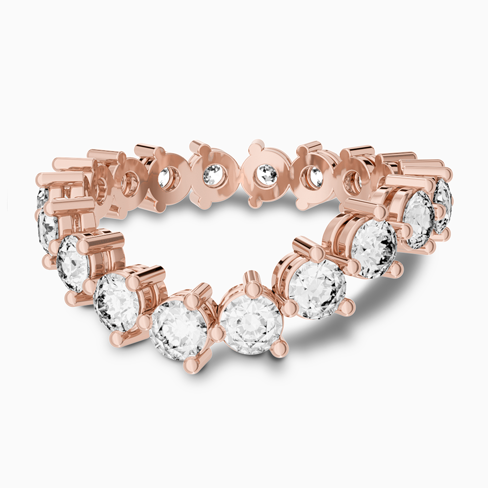 Canadian-made diamond eternity wedding ring in 14K rose gold with a shared prong setting.