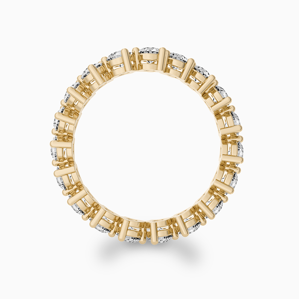 Ecksand Canadian-made diamond eternity wedding ring in 18K yellow gold. Side view.