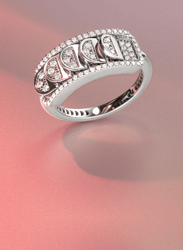 a canadian-made 18k white gold reversible diamond pave crescent ring