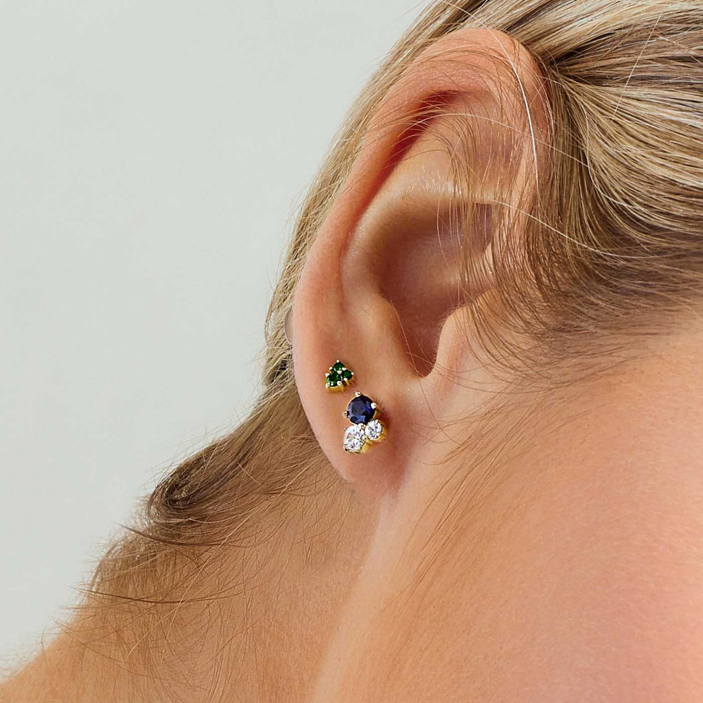 The Ecksand Cluster Diamond and Blue Sapphire Stud Earrings shown with  in 