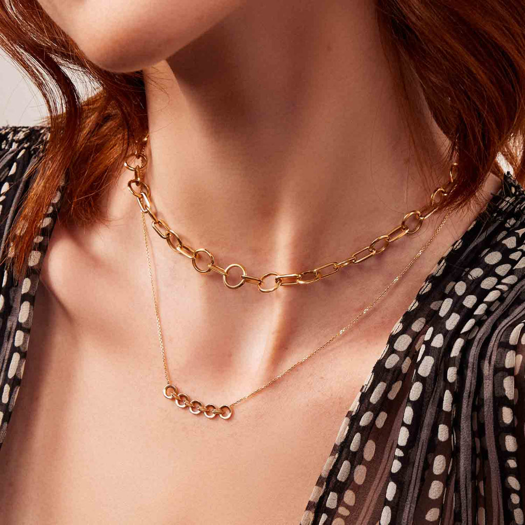 The Ecksand Duel Gold Chain Necklace shown with  in 