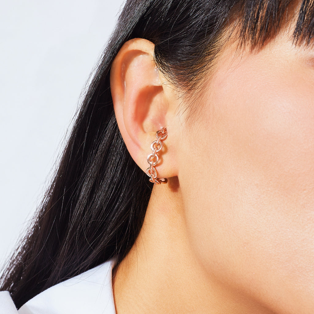 The Ecksand Gold Chain Earlobe Cuff Earrings shown with  in 