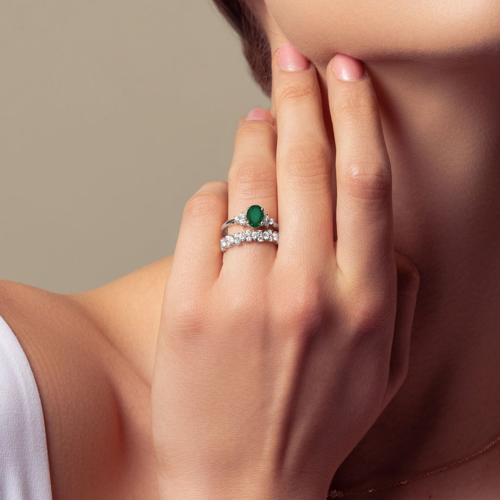 The Ecksand Emerald Engagement Ring with Six Side Diamonds shown with  in 