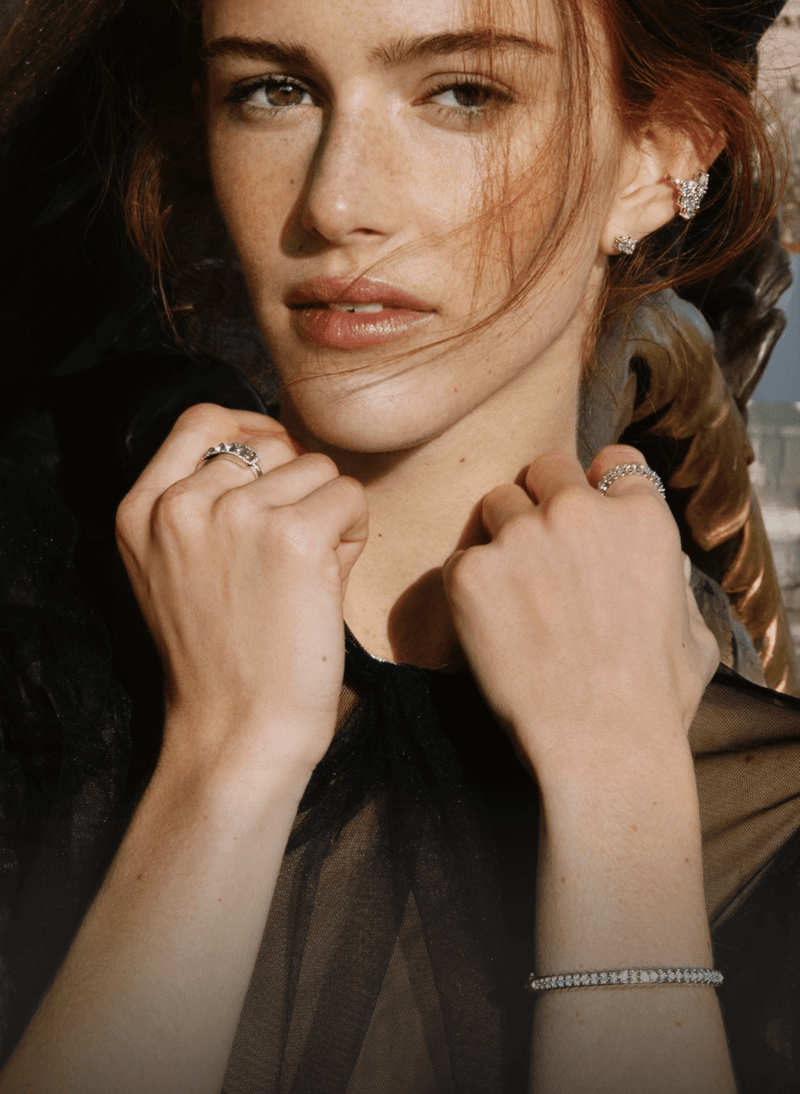 a model wearing canadian-made 18k white gold fine jewelry from ecksand's aura collection