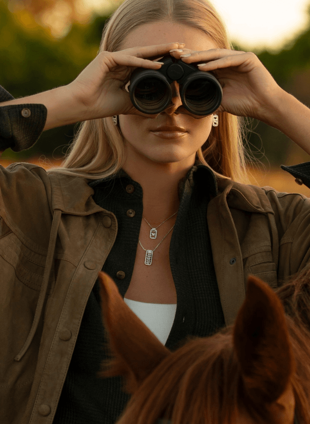 a model wearing canadian-made 18k white gold fine jewelry from ecksand's aura collection