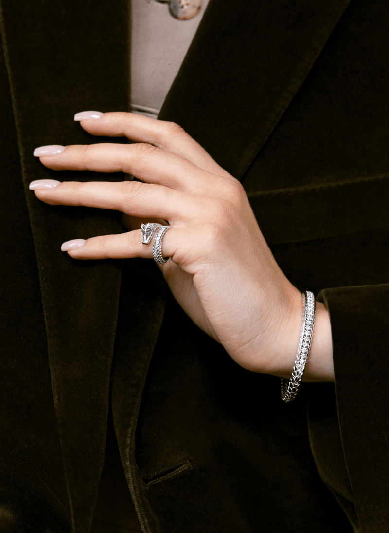 model wearing canadian-made 18k white gold dragon scale jewelry with diamonds from ecksand's arctic dragon collection