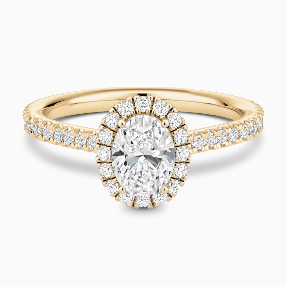 The Ecksand Iconic Diamond Engagement Ring with Halo and Diamond Pavé shown with Oval in 18k Yellow Gold