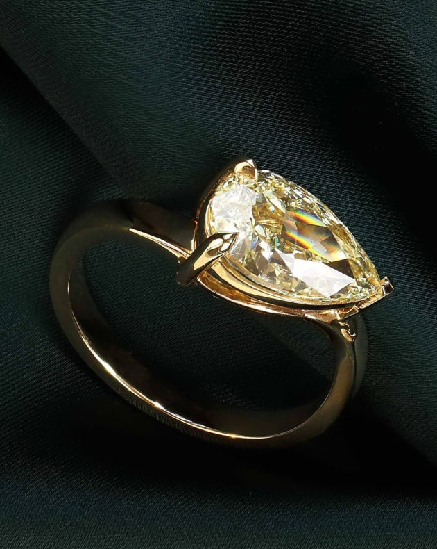 canadian-made 18k yellow gold east west yellow diamond ring