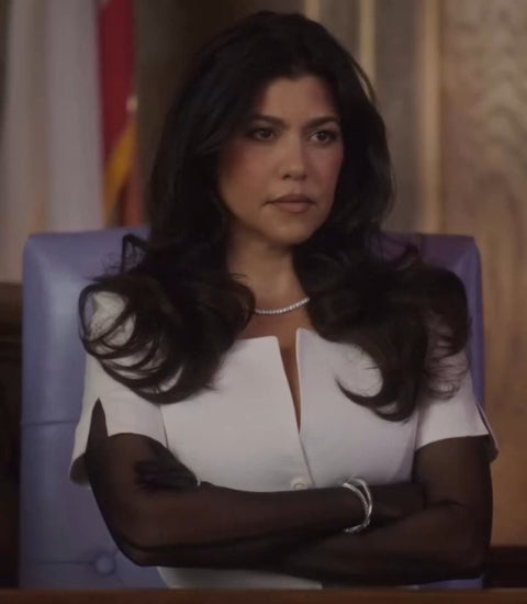 Kourtney Kardashian wearing a Canadian-made diamond river necklace, white gold diamond bangle and diamond tennis bracelet.