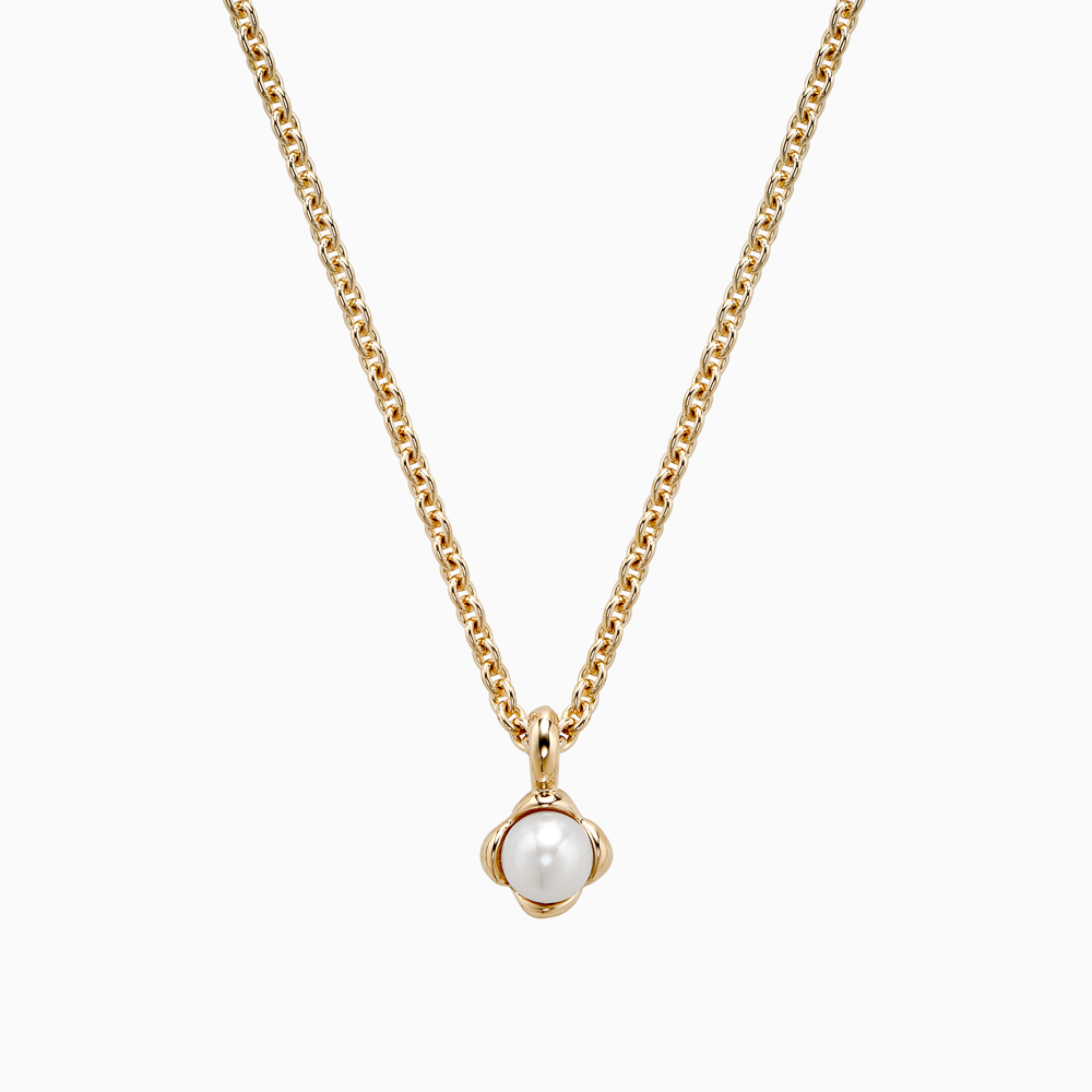The Ecksand Mini Snowball Freshwater Pearl Necklace shown with Kid | loops at 14" & 16" in 18k Yellow Gold