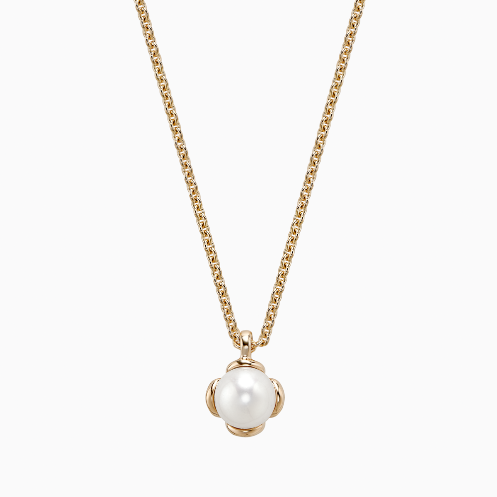 The Ecksand Snowball Freshwater Pearl Necklace shown with Kid | loops at 14" & 16" in 14k Yellow Gold