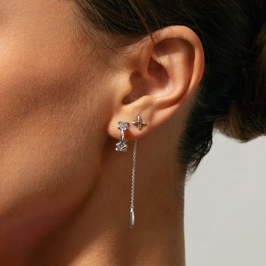 The Ecksand X Dangle Jacket Earrings shown with  in 