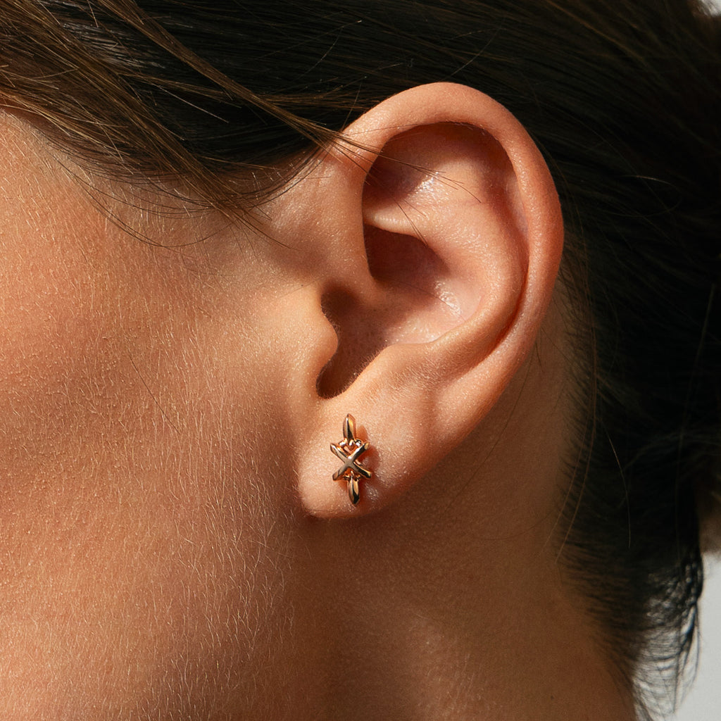 The Ecksand X Stud Earrings shown with  in 