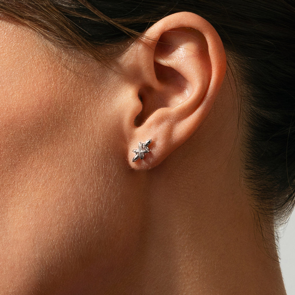 The Ecksand X Stud Earrings shown with  in 