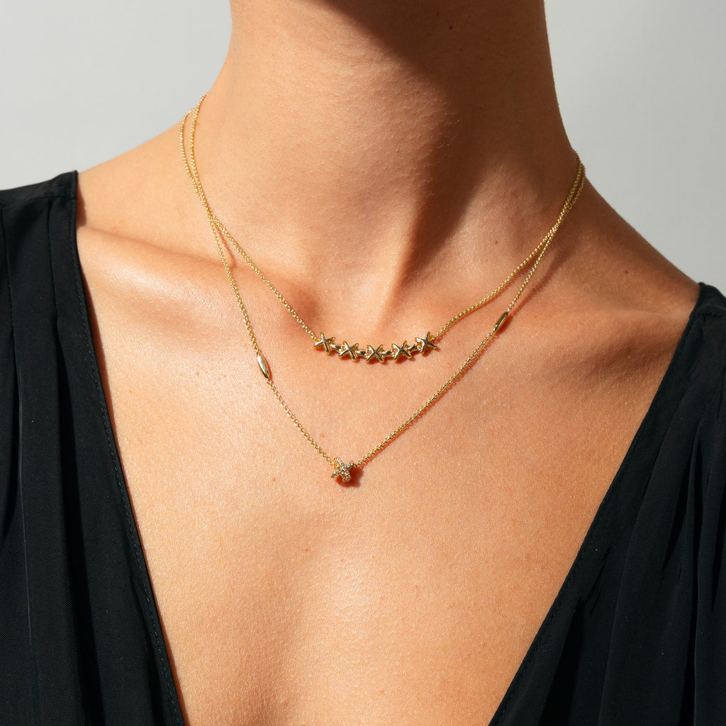 The Ecksand Five X's Chain Necklace shown with  in 