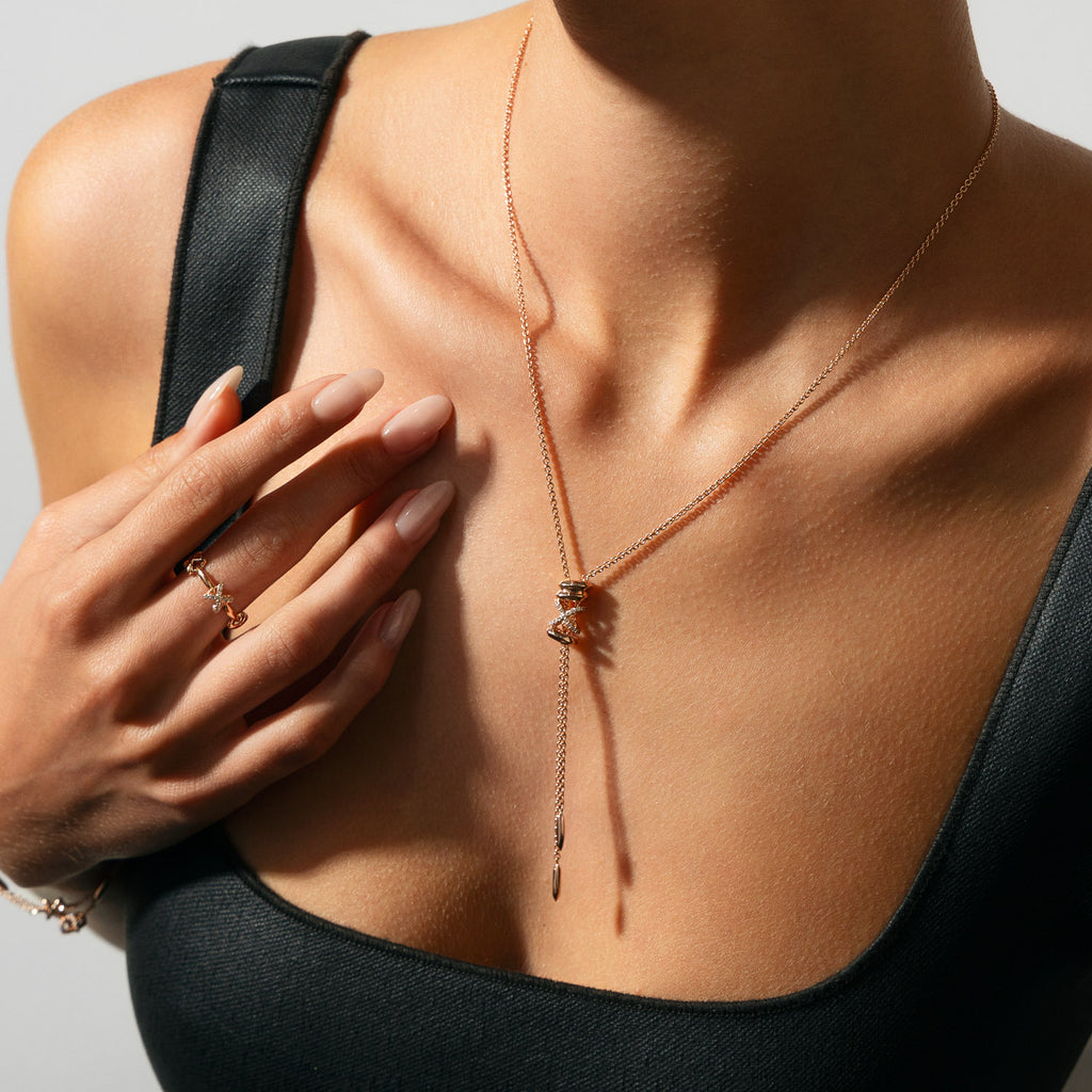 The Ecksand Iconic X Lariat Necklace shown with  in 