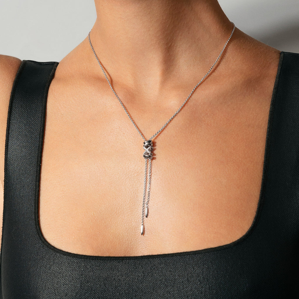 The Ecksand Iconic X Lariat Necklace shown with  in 