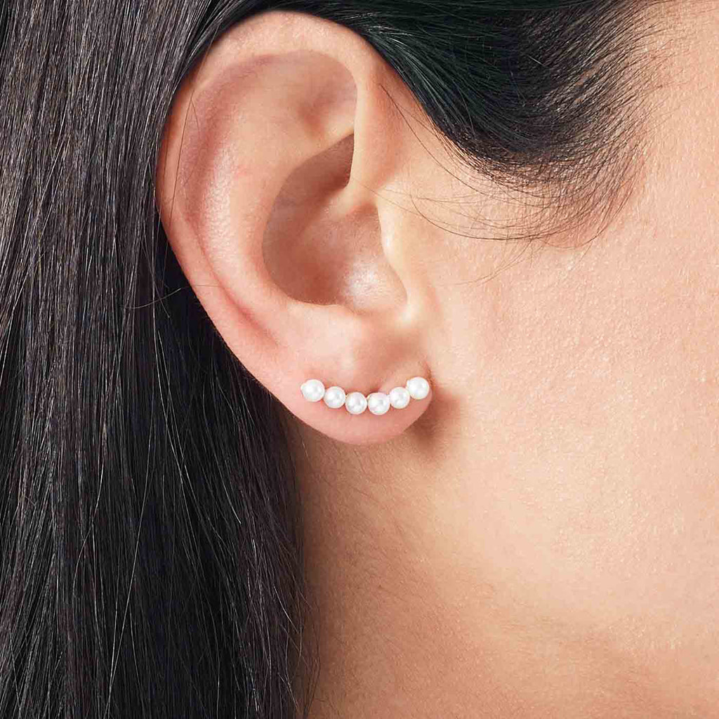 The Ecksand Freshwater Pearl Long Stud Earrings shown with  in 