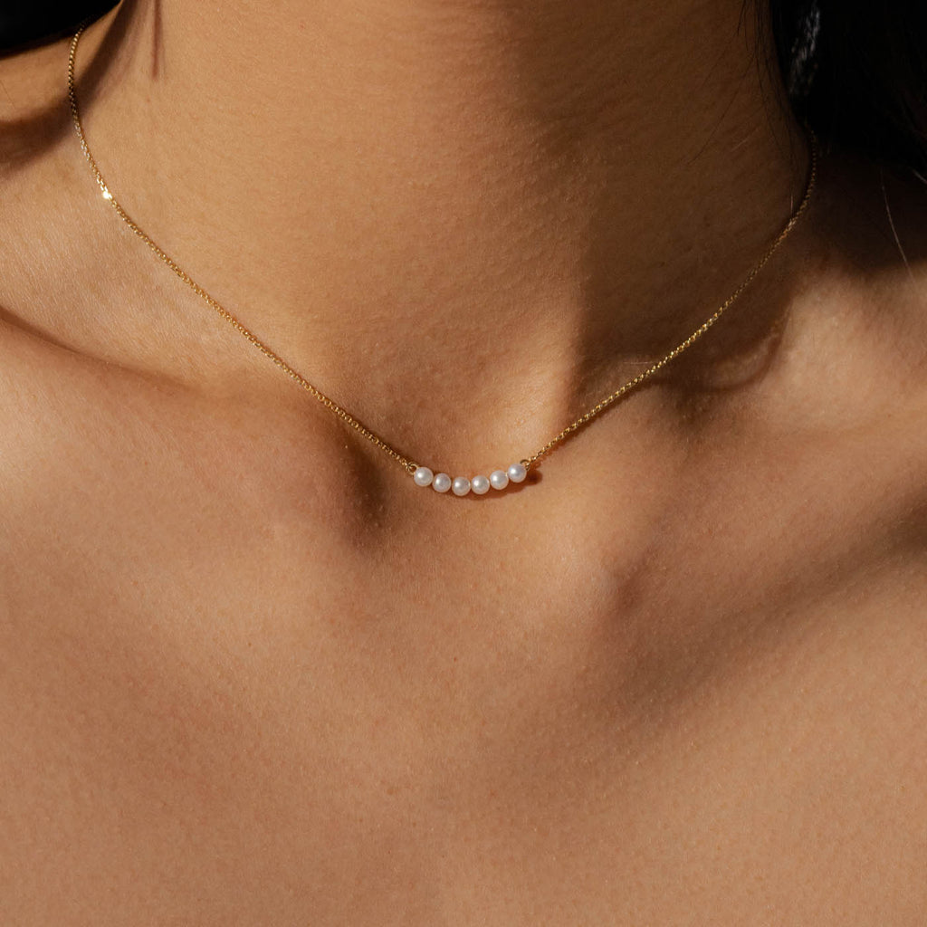 The Ecksand Freshwater Pearl Necklace shown with  in 