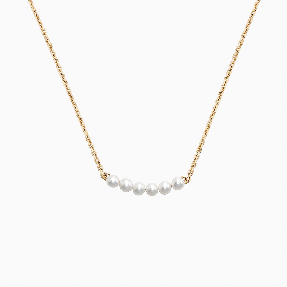 The Ecksand Freshwater Pearl Necklace shown with  in 14k Yellow Gold