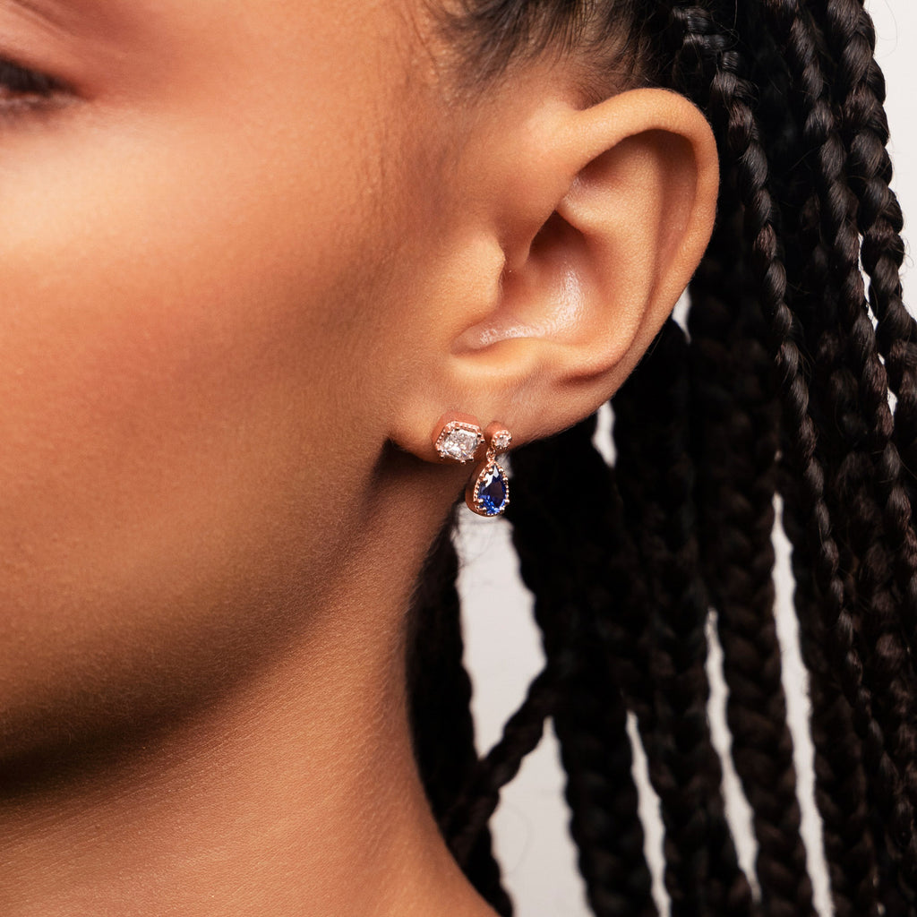 Model wearing Ecksand's Asscher Diamond Stud Earrings with Milgrain Halo in 18k Rose Gold, Natural VS2+/ F+ #3