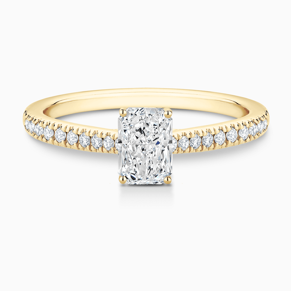 The Ecksand Diamond Engagement Ring with Secret Heart and Diamond Band shown with Radiant in 18k Yellow Gold