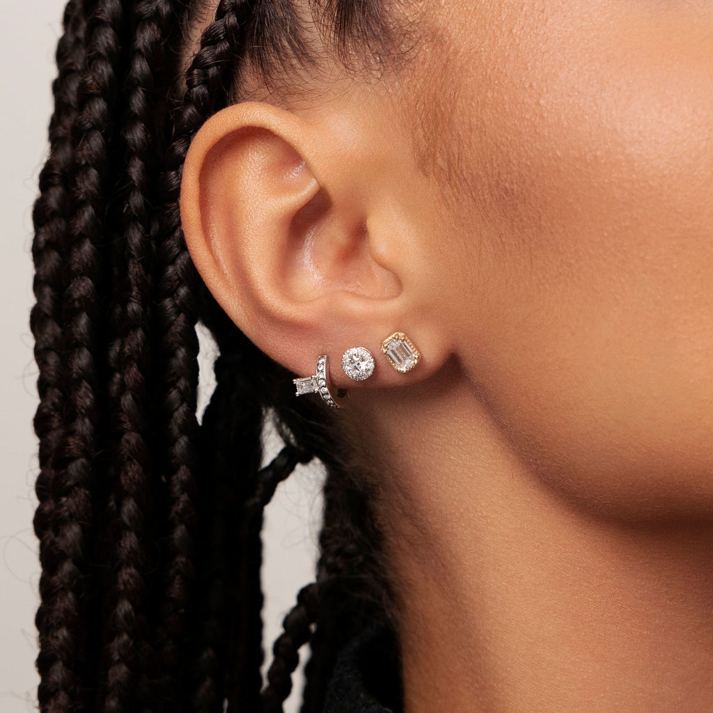 Model wearing Ecksand's Emerald Diamond Stud Earrings with Milgrain Halo in 18k Yellow Gold, Lab-grown VS2+/ F+ #2